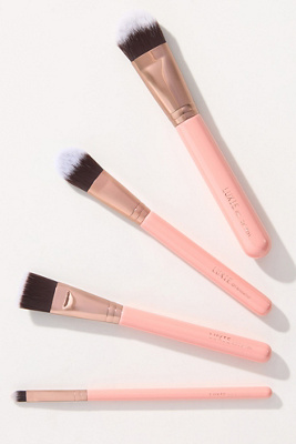 Shop Luxie Skinsentials Four-piece Set In Pink