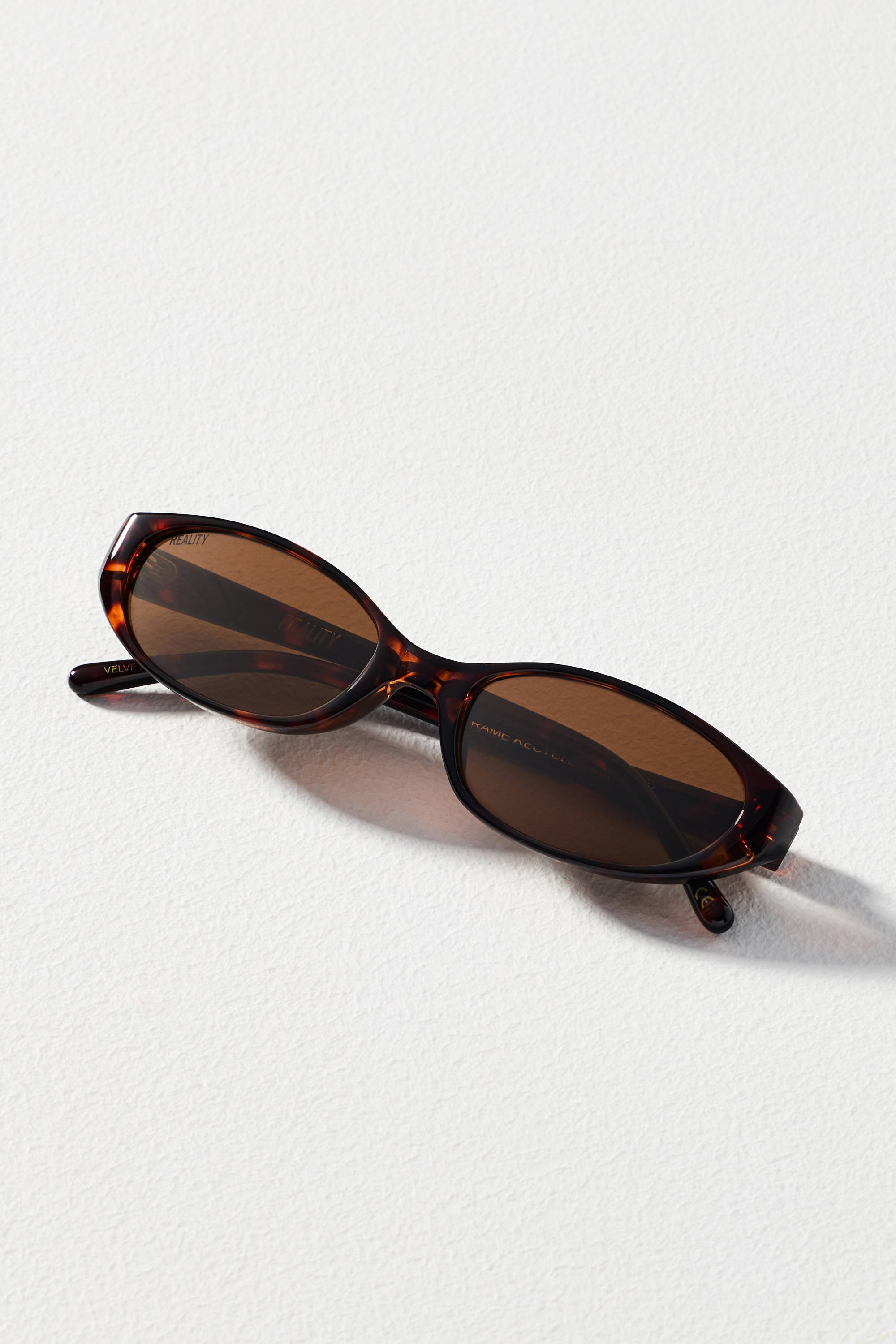 Velvet Kitten Slim Oval Sunglasses