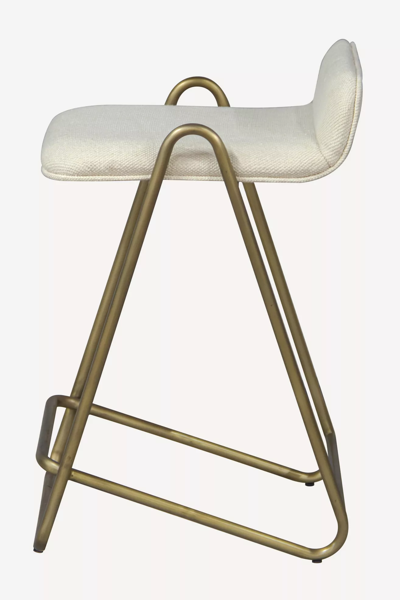 Light upholstered counter stool with brass-toned metal legs and arched handle supports