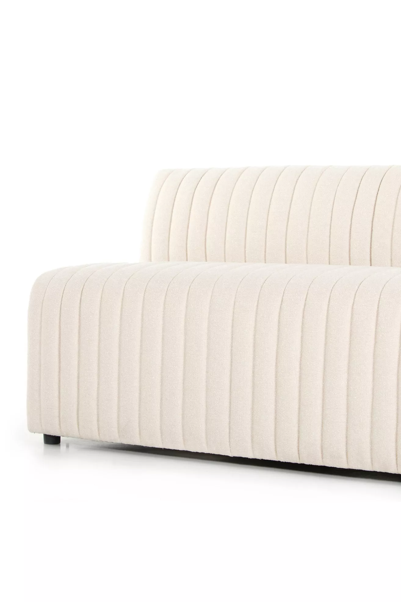 Close-up of base-to-upholstery seam on white bench