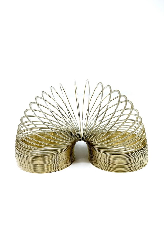 Old Flame Candle Co. Vintage 1980s Brass Slinky Toy #1