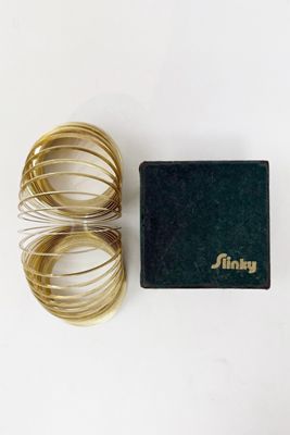 Old Flame Candle Co. Vintage 1980s Brass Slinky Toy
