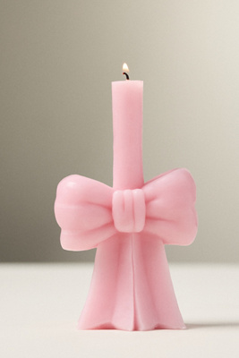 Anthropologie Bow Shaped Wax Candle In Pink