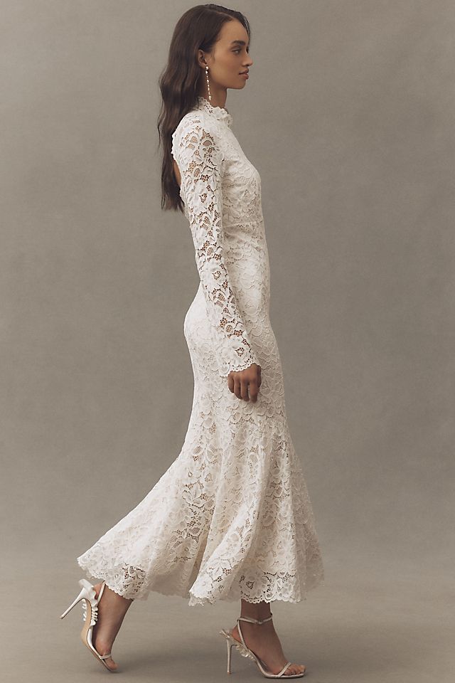 long lace dress with sleeves Heirloom Gown | Liylah Bold embroidery through out on a solid one tone with soft jewel placement detail Lace Backless Long Sleeve Midi