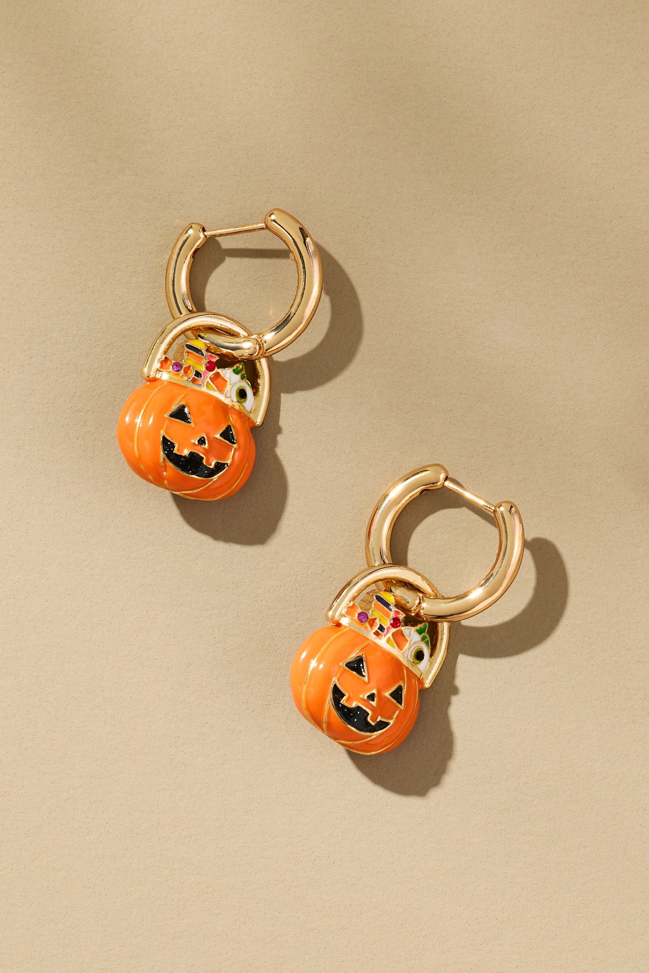 BaubleBar Laughing Jack Huggie Earrings