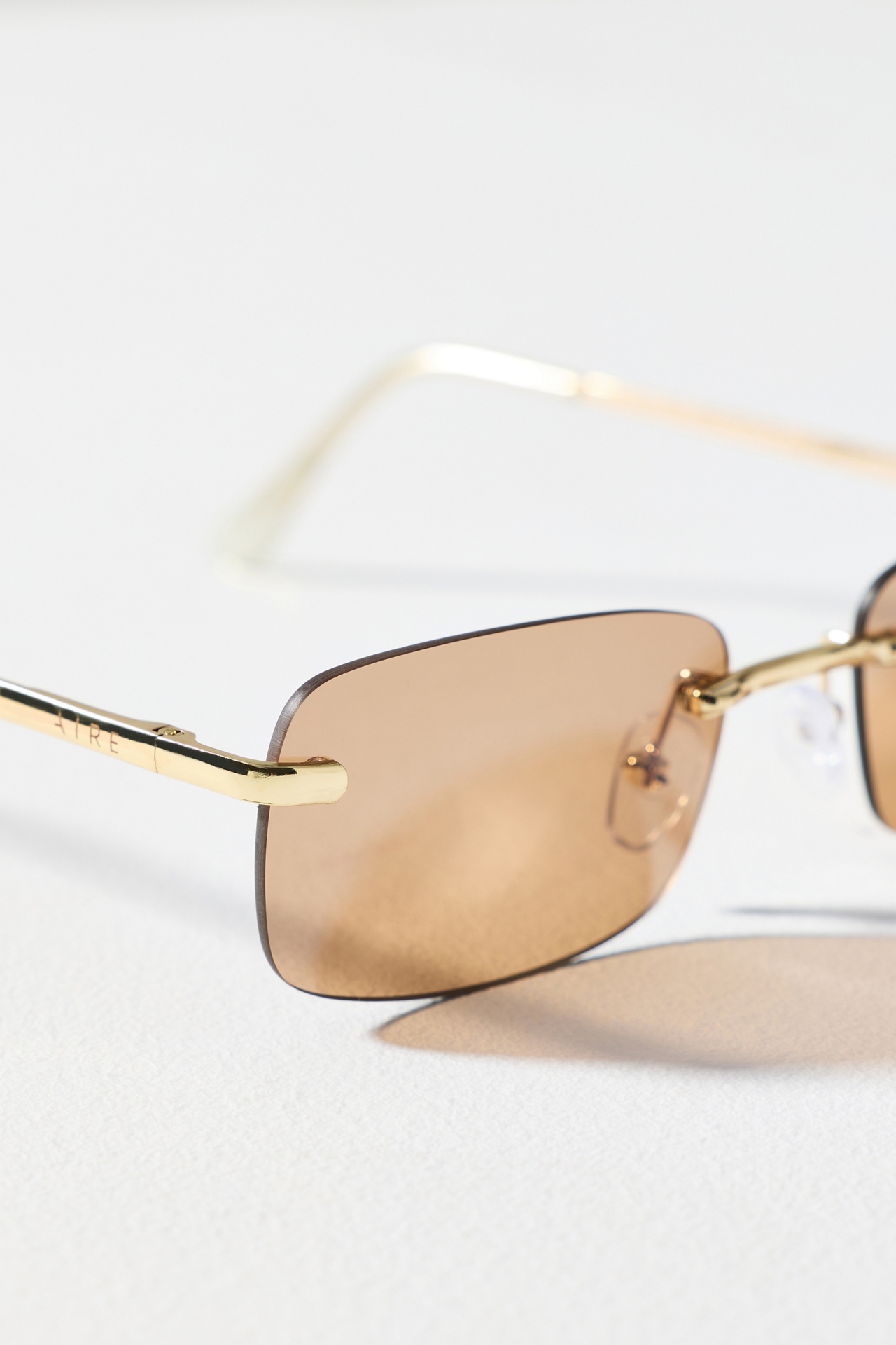 AIRE Frameless Rectangle Sunglasses