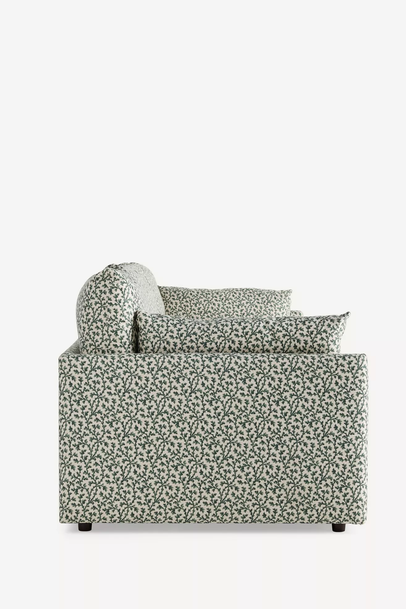 arm of sofa with botanical print fabric