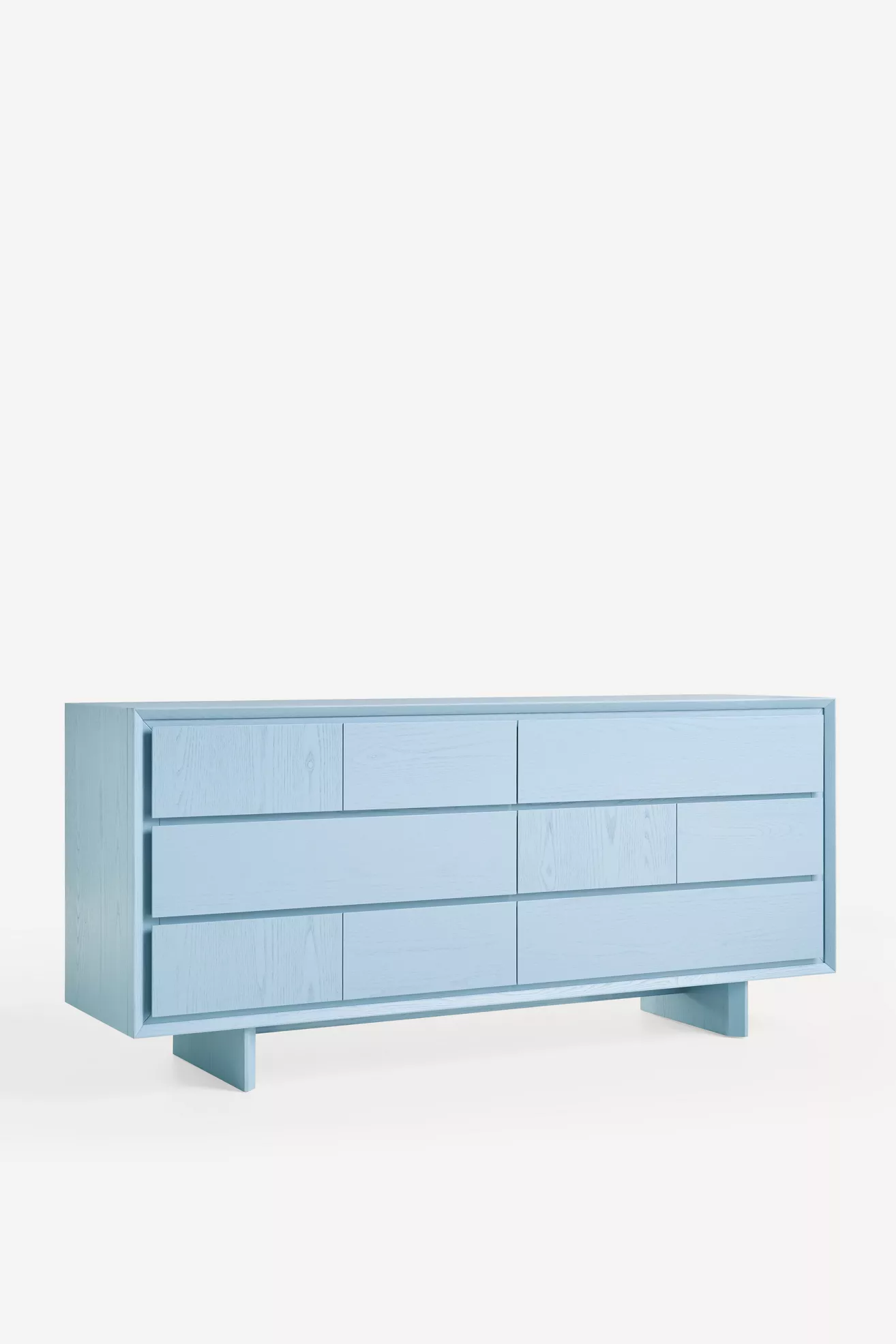 side perspective of the blue six-drawer dresser
