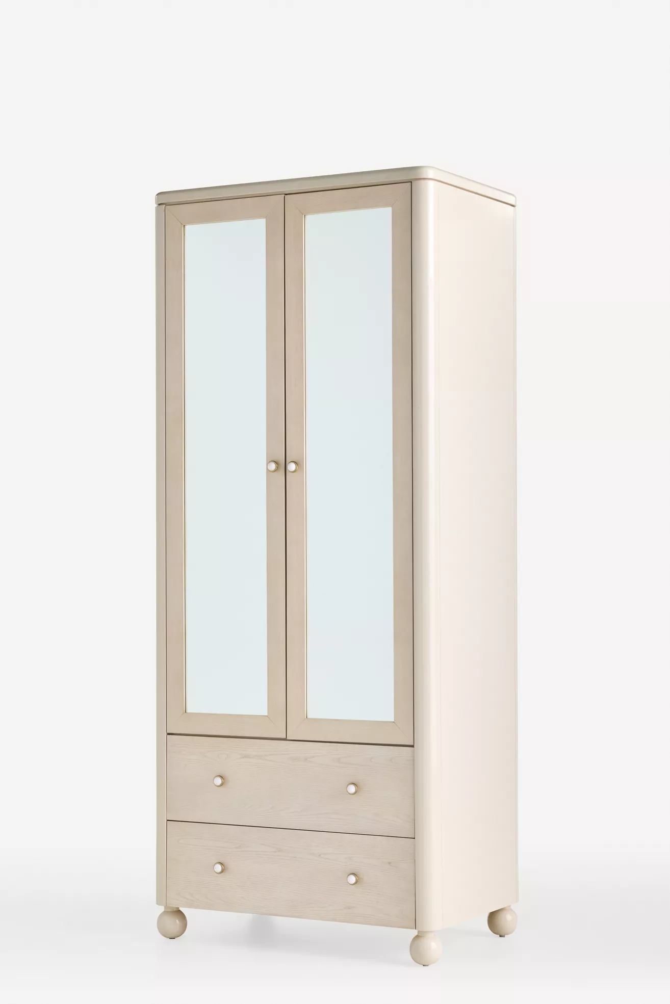 Three-quarter view of Tasha Lacquer Armoire showing mirrors and drawers