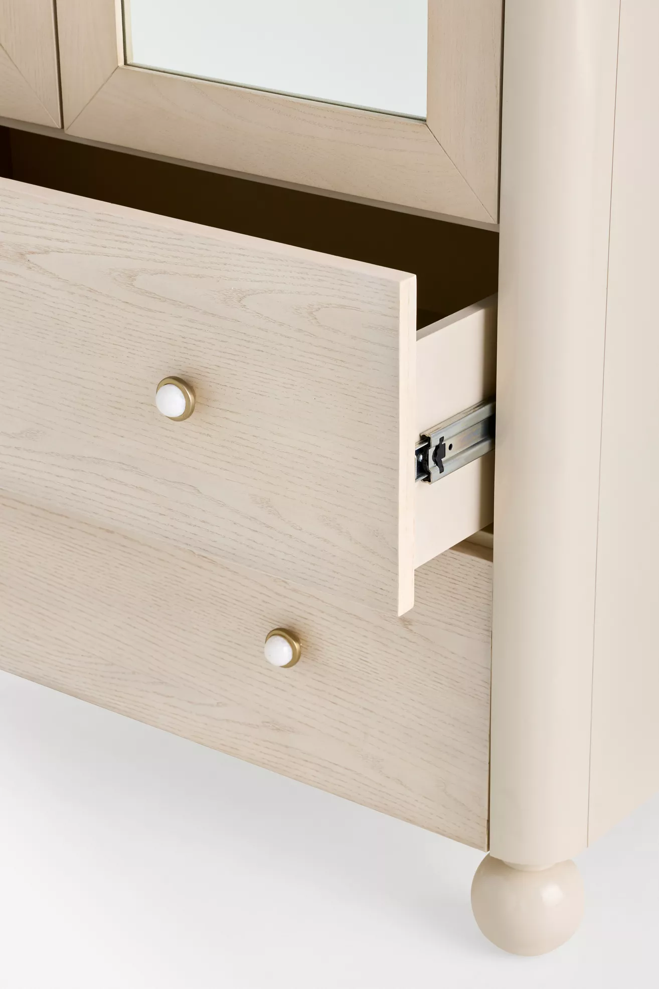 Drawer close-up showing wood grain and hardware