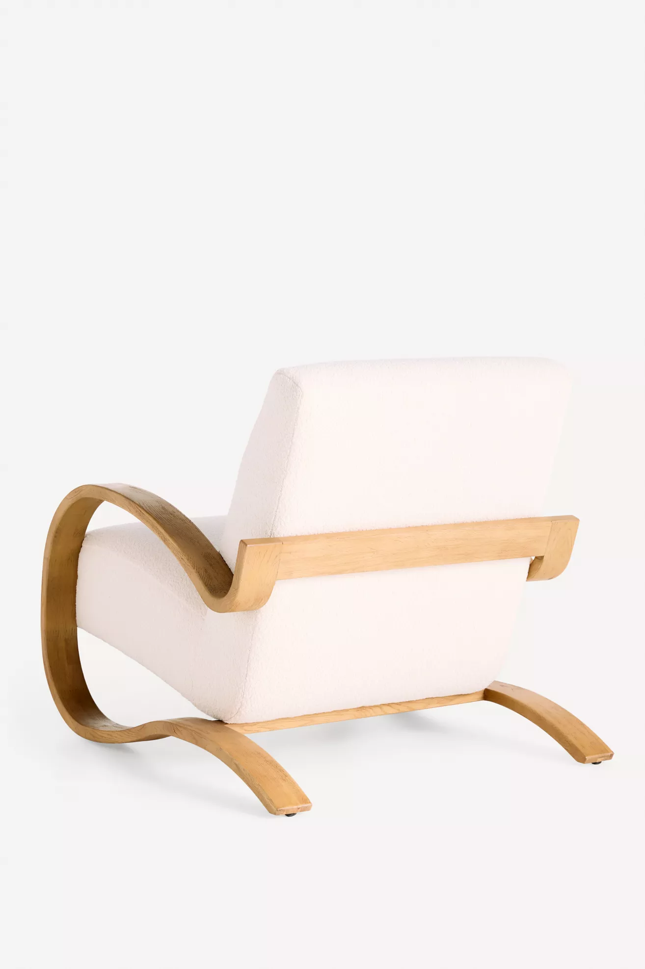 Back/side view of Herbin Wood Lounge Chair focusing on curved wooden frame