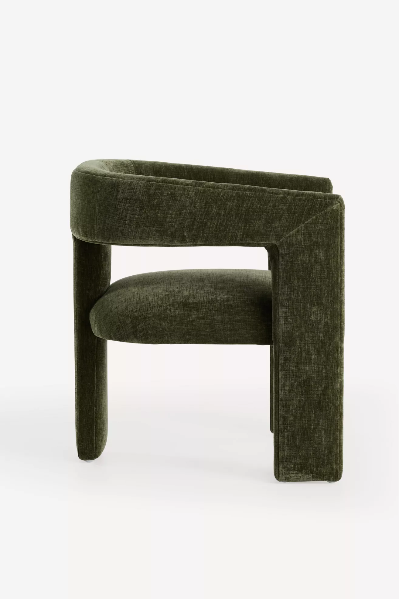 Side view of the green velvet dining chair