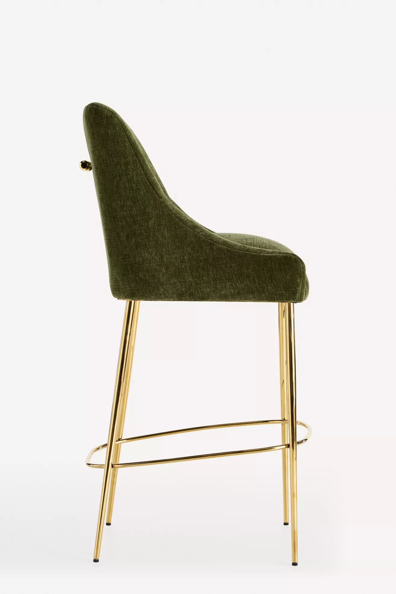 Profile side view of green velvet bar stool showing back and side leg