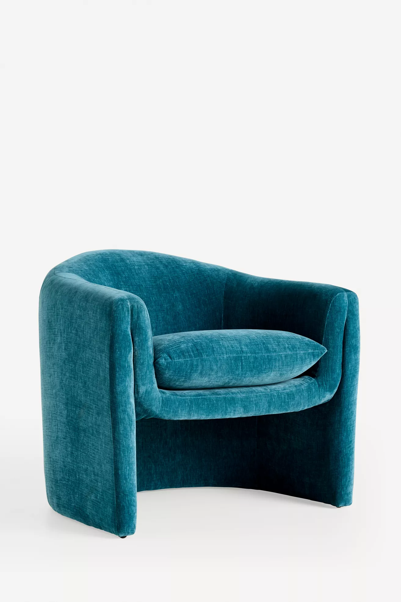 Front-right three-quarter view of teal sculptural chair
