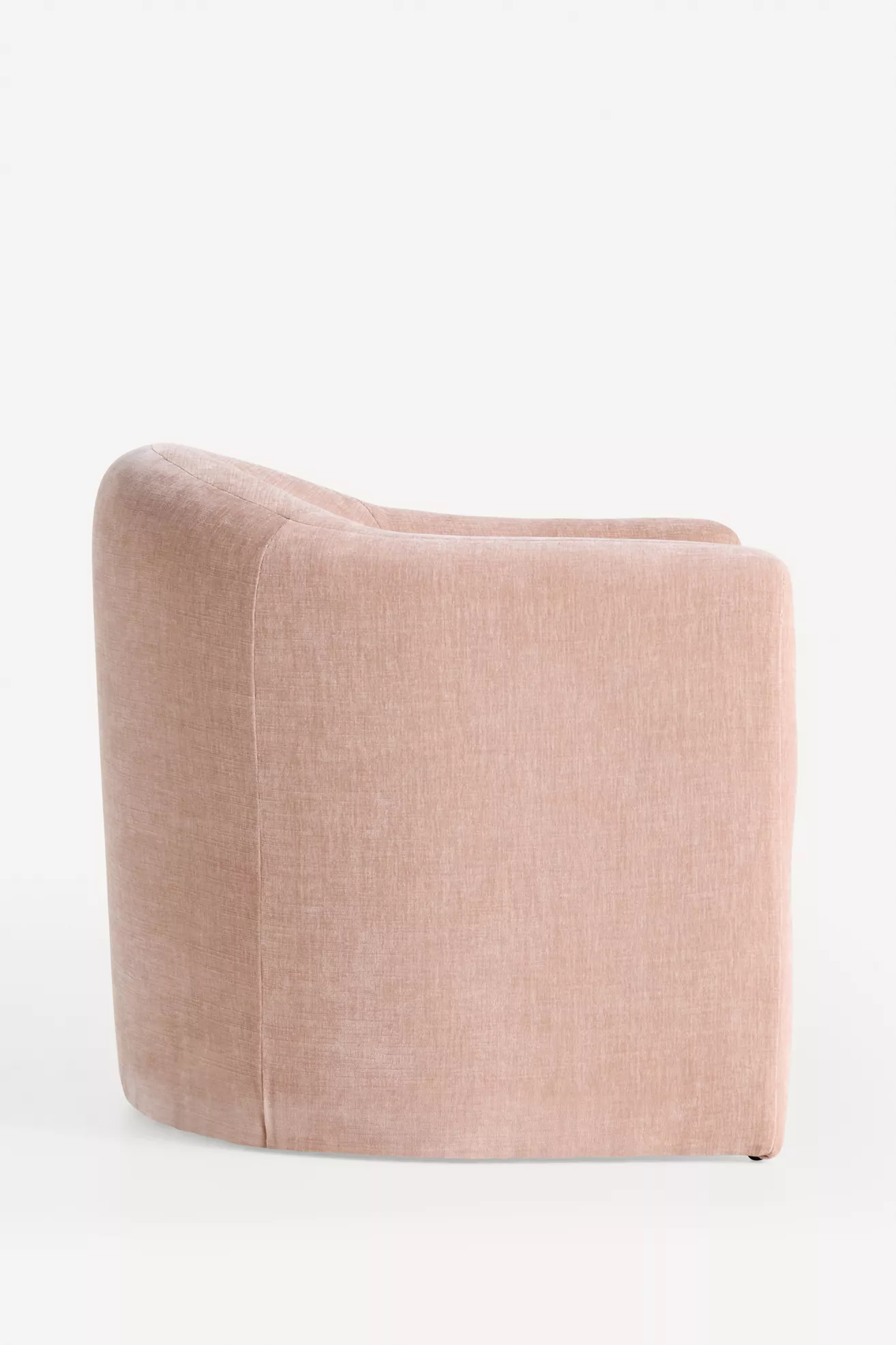 Back view of pink velvet sculptural chair