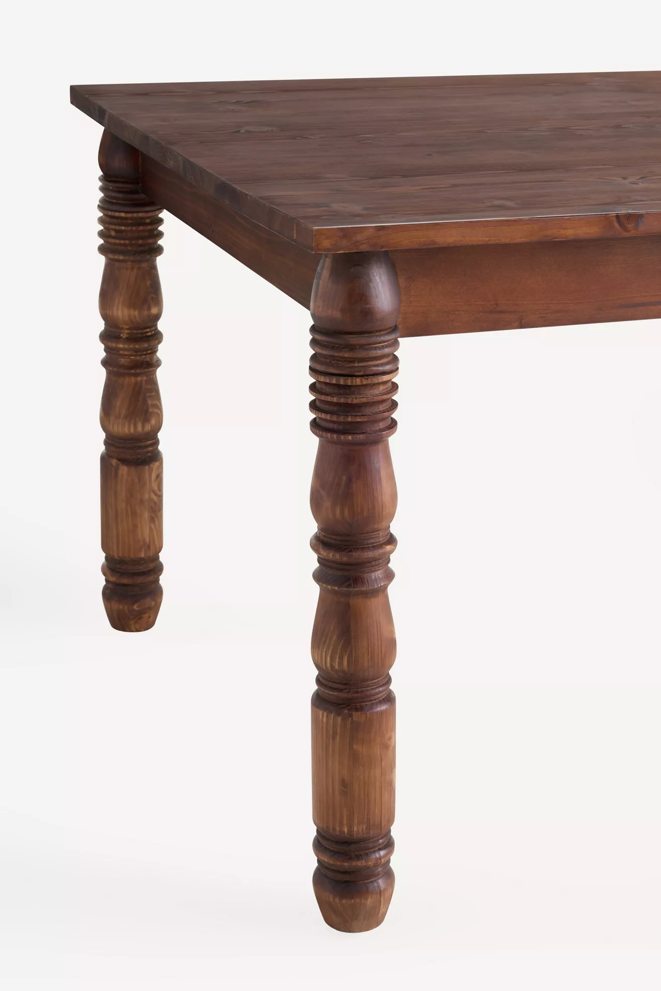 Close-up of table leg with carved details