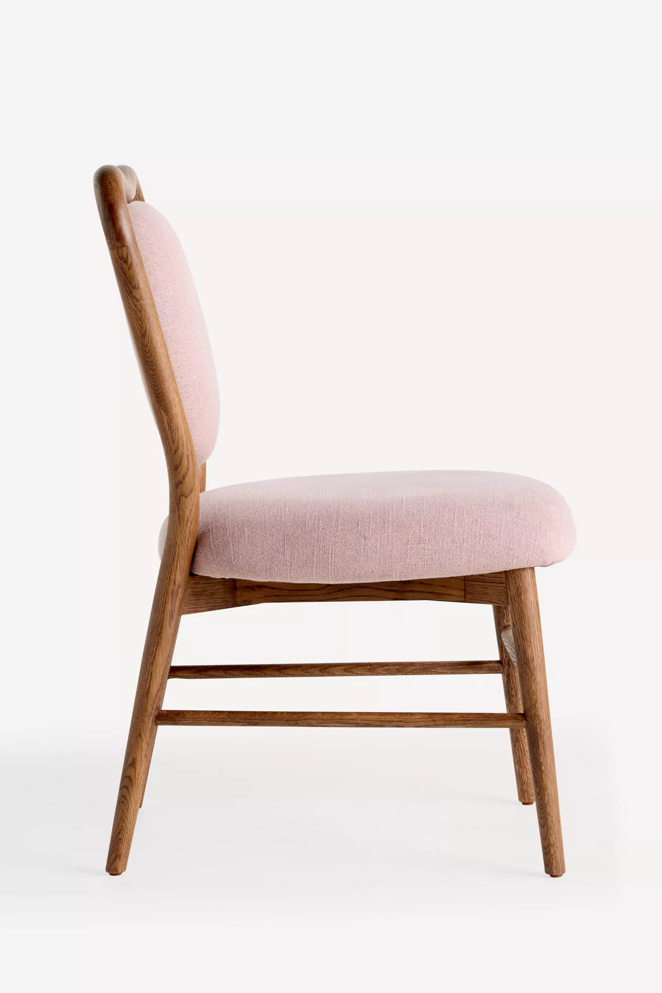 Side view of dining chair showing seat and leg structure