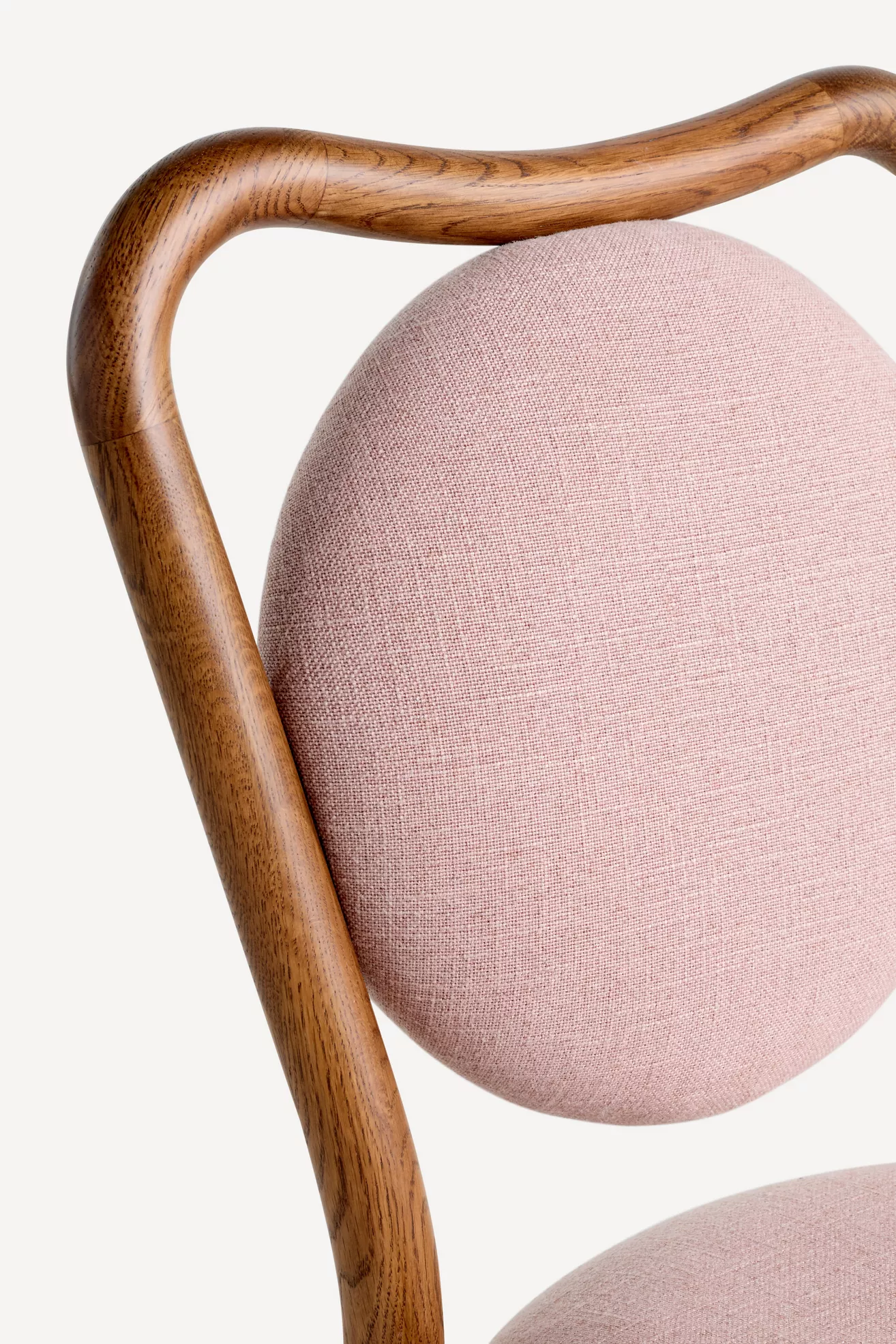 Close-up of pink upholstery on backrest