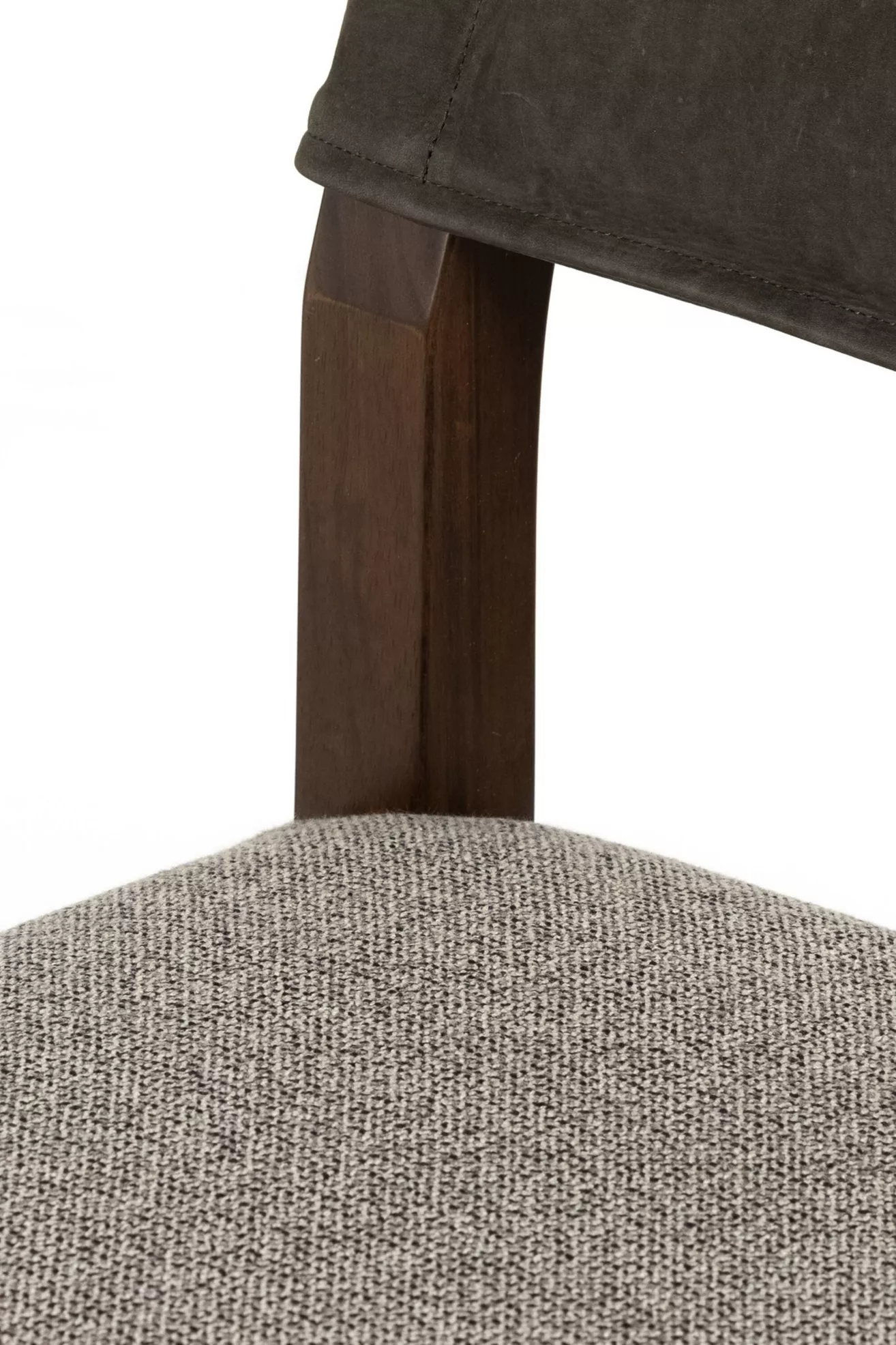 Close-up of seat cushion and wood frame connection