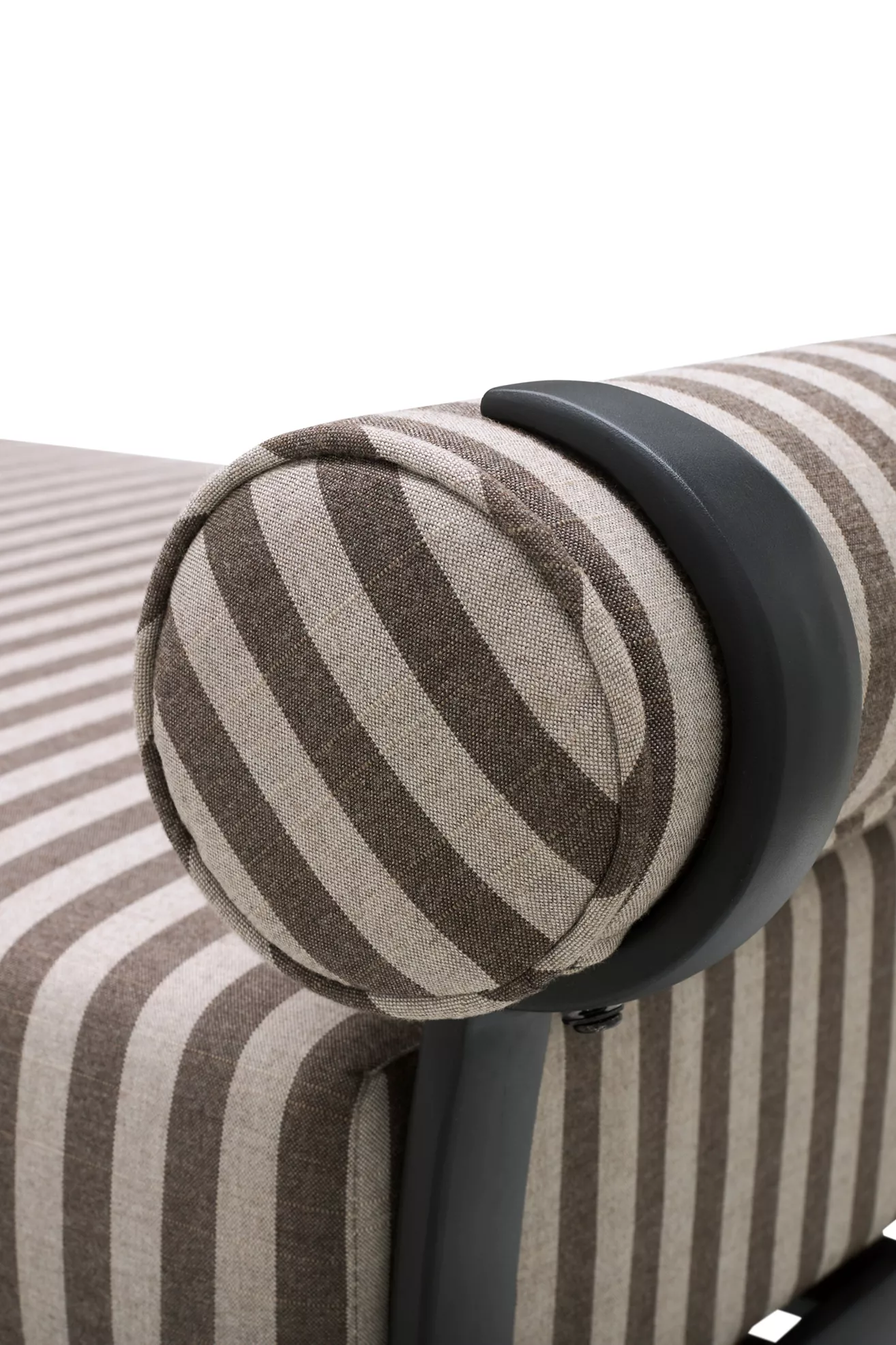 Close-up of striped arm bolster and frame on Ashley Childers Antibes bench