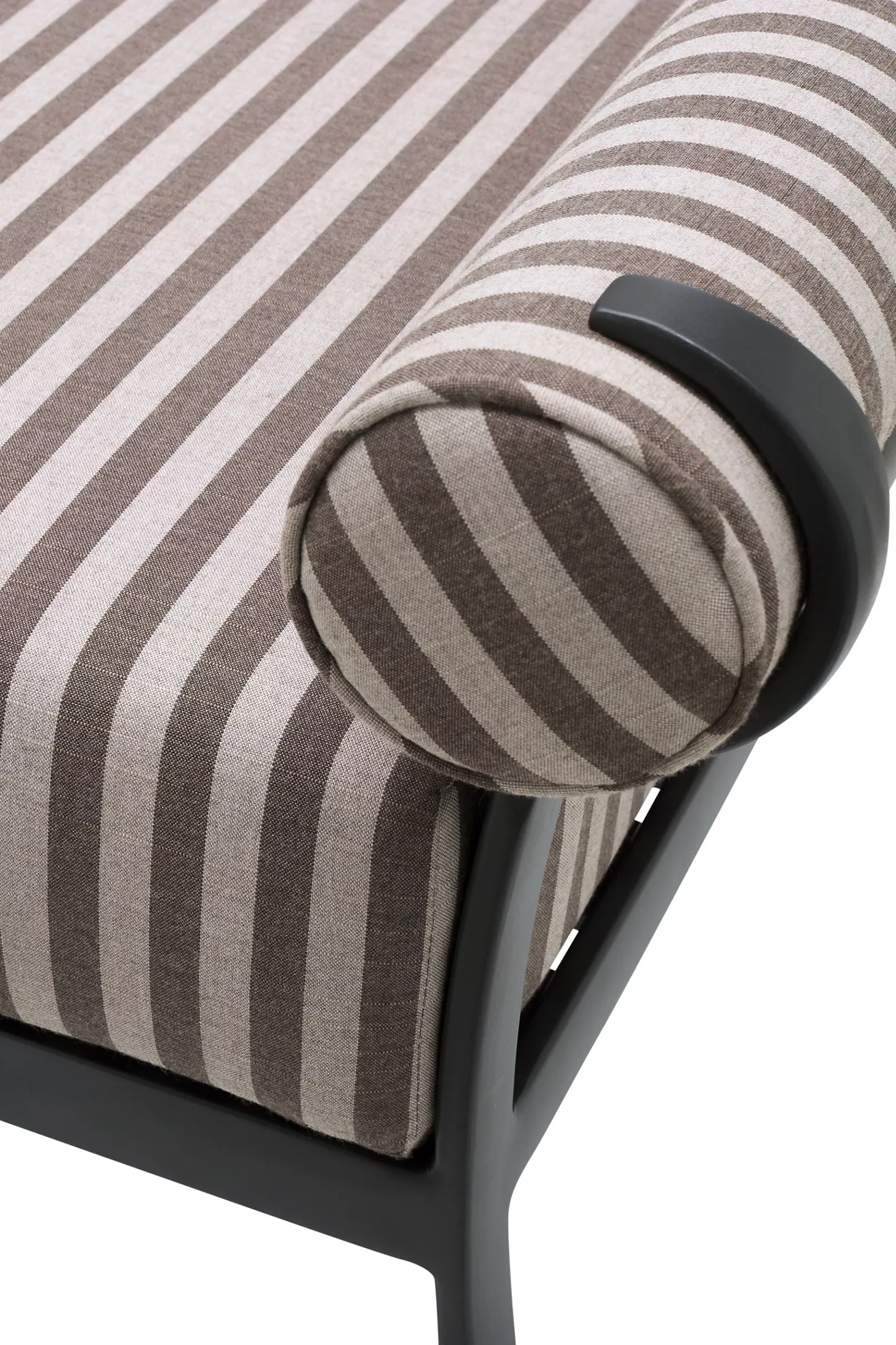 Close-up of striped cylindrical arm bolster on Ashley Childers Antibes bench