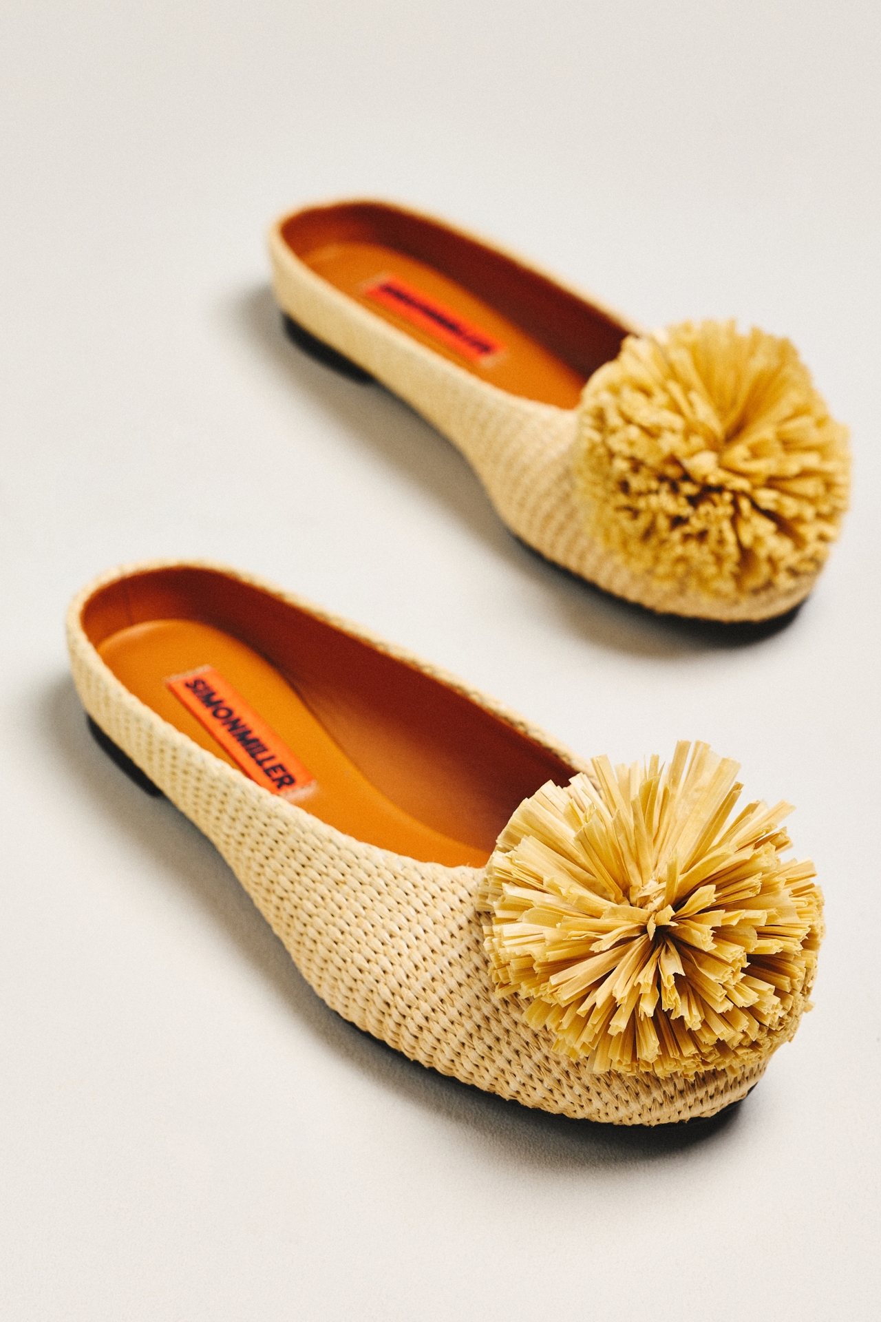 SIMONMILLER Pom Woven Raffia Flats