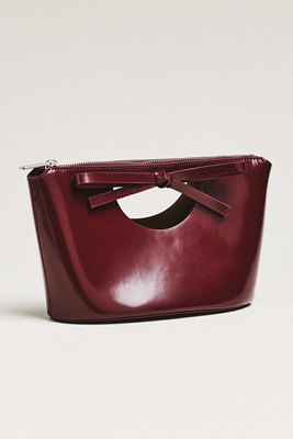 Studio Amelia Sofia Leather Bow Clutch In Burgundy