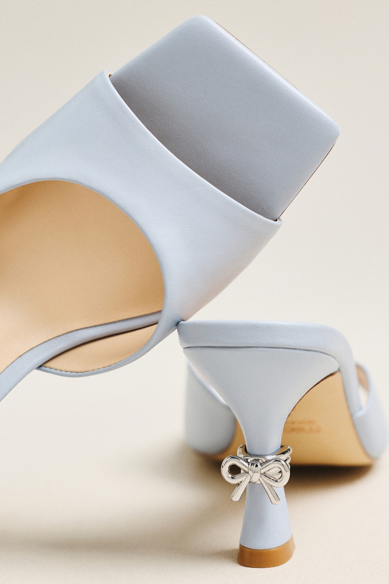 Maeve Metal Bow Open-Toe Mule Heels