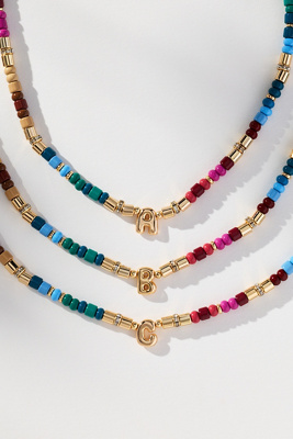 By Anthropologie Beaded Monogram Necklace In Brown