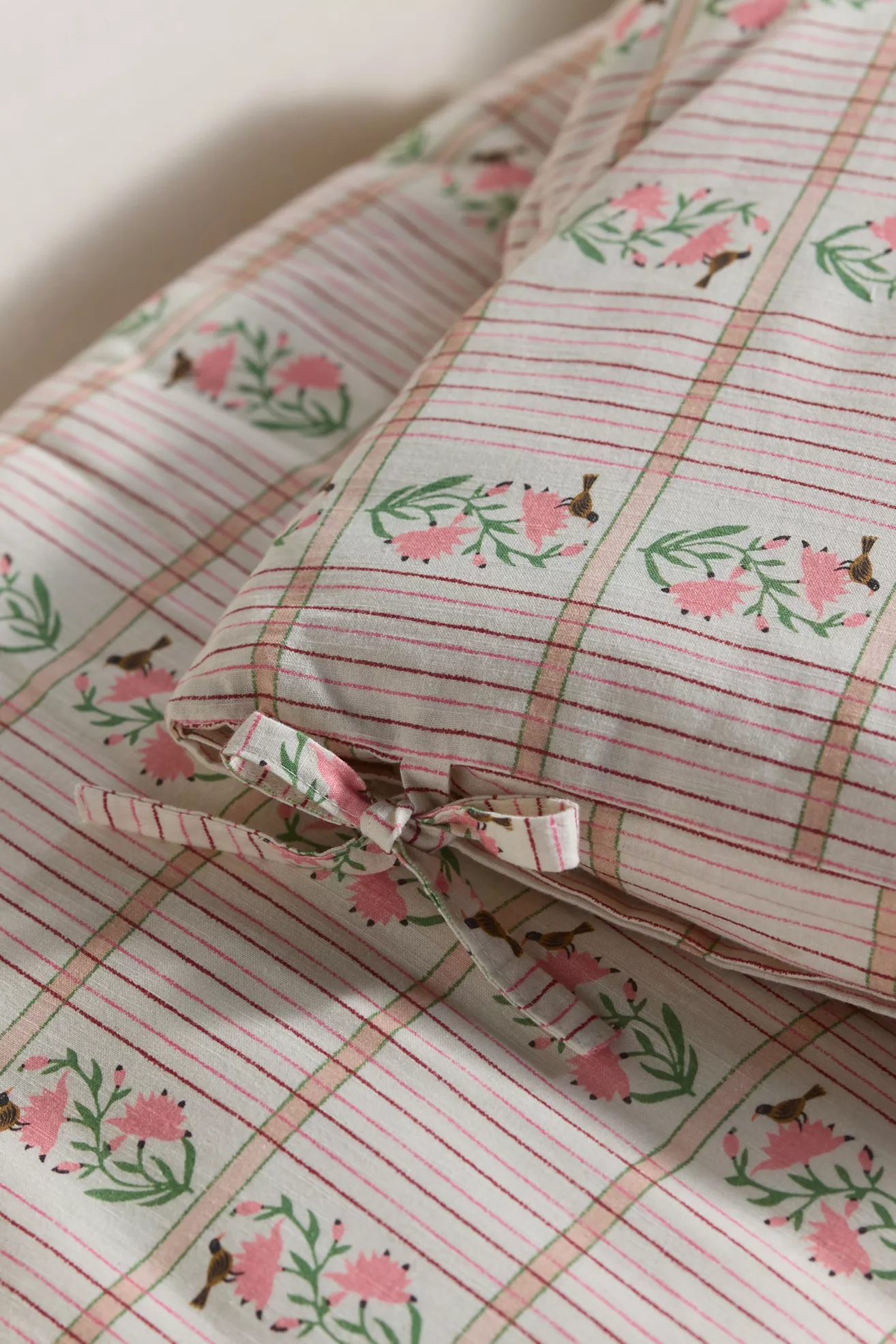 Close-up of tassel ties on cotton printed topper