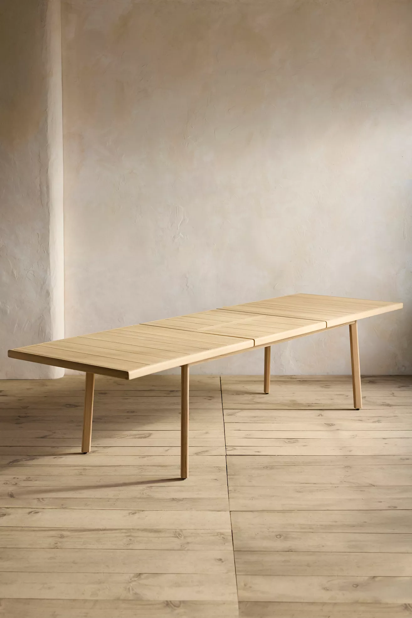 Grove Teak extension dining table with leaf fully portioned