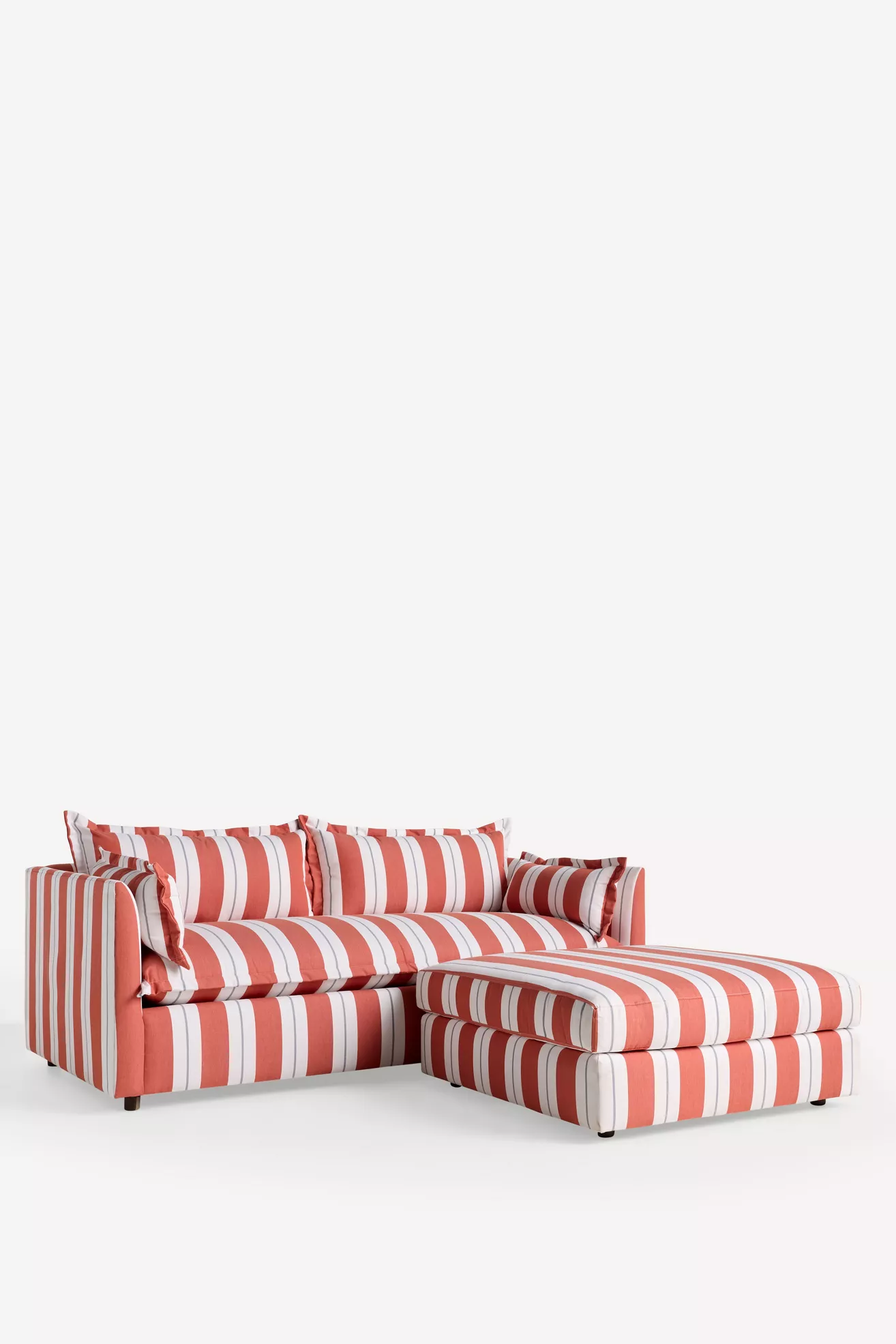 Side view of coral and white striped sectional with chaise