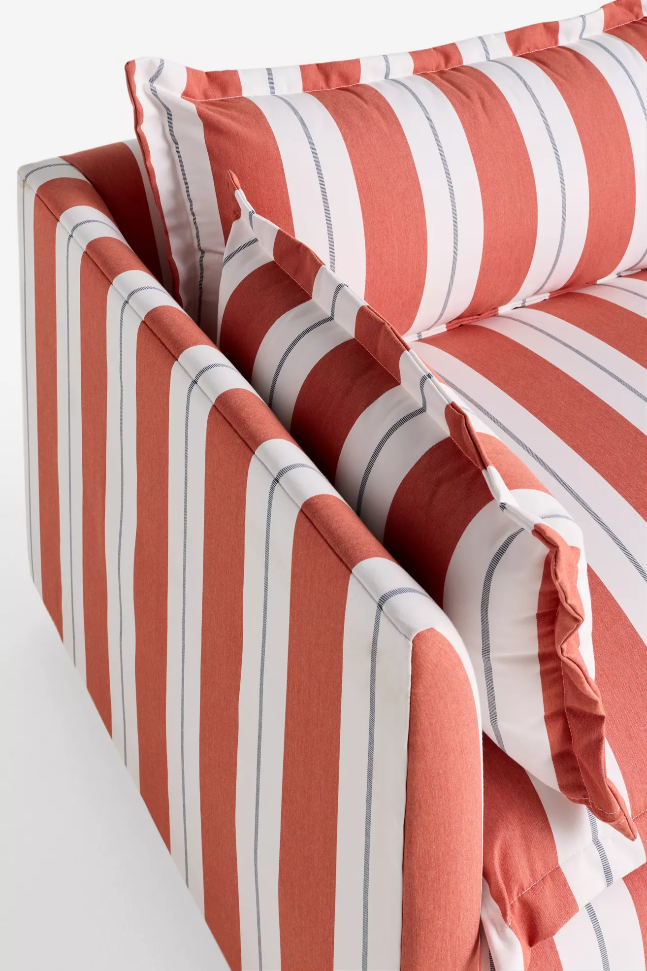 Close-up of striped fabric and piping on the sofa