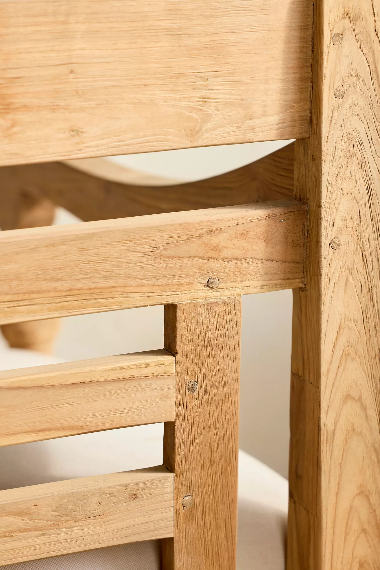 Close-up of chair back and arm joint