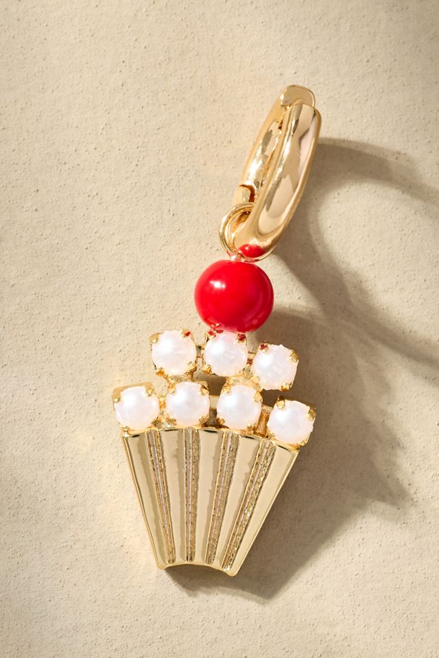 Boucles d'oreilles huggie icône festive #1