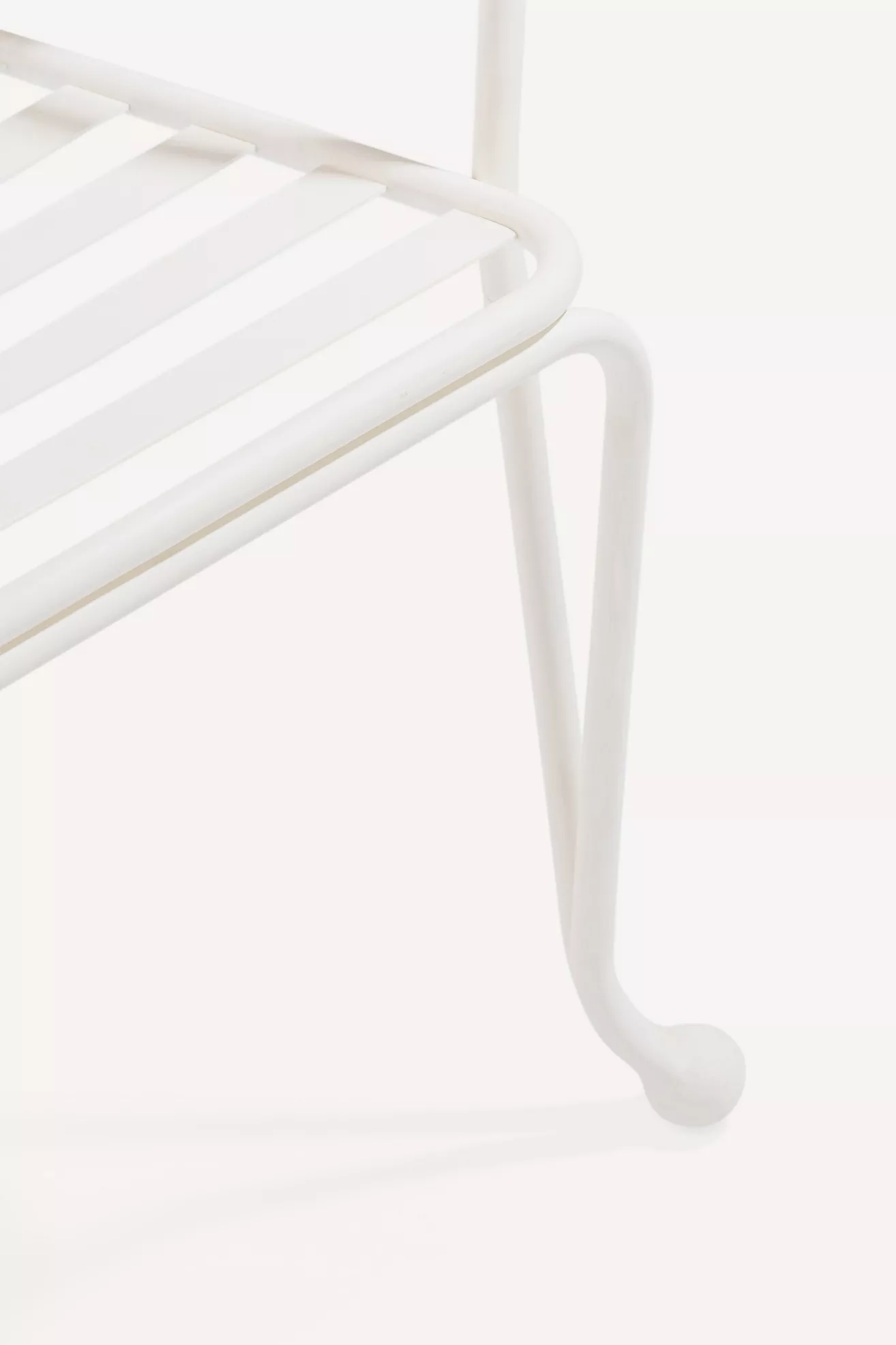 Close-up of chair leg corner and foot