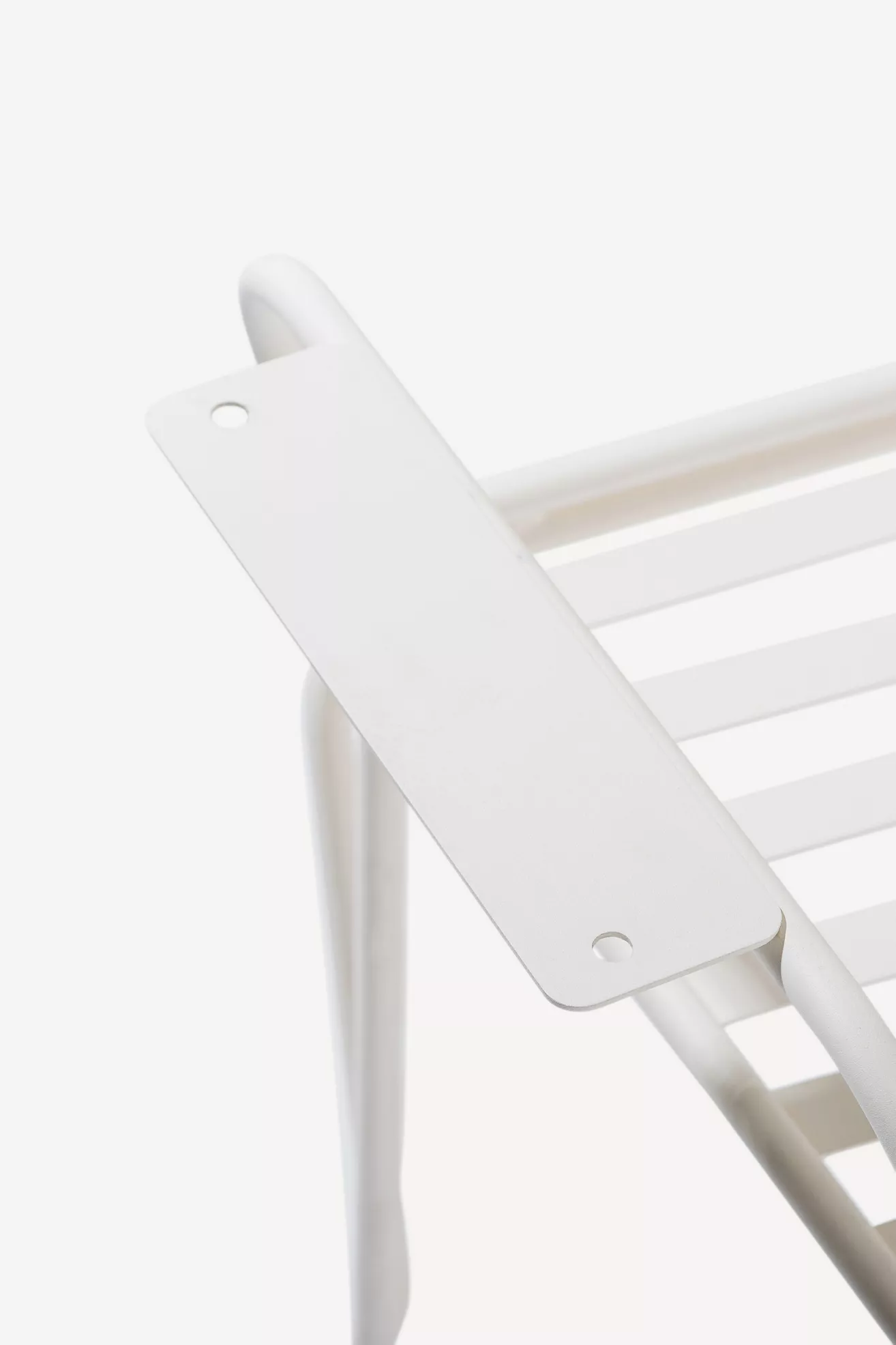 Top plate with holes for assembly on armrest bracket