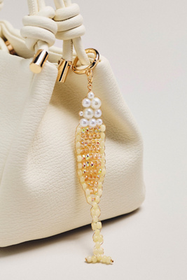 By Anthropologie Beaded Drinks Bag Charm In Gold