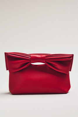 By Anthropologie Cutout Handle Bow Clutch In Red