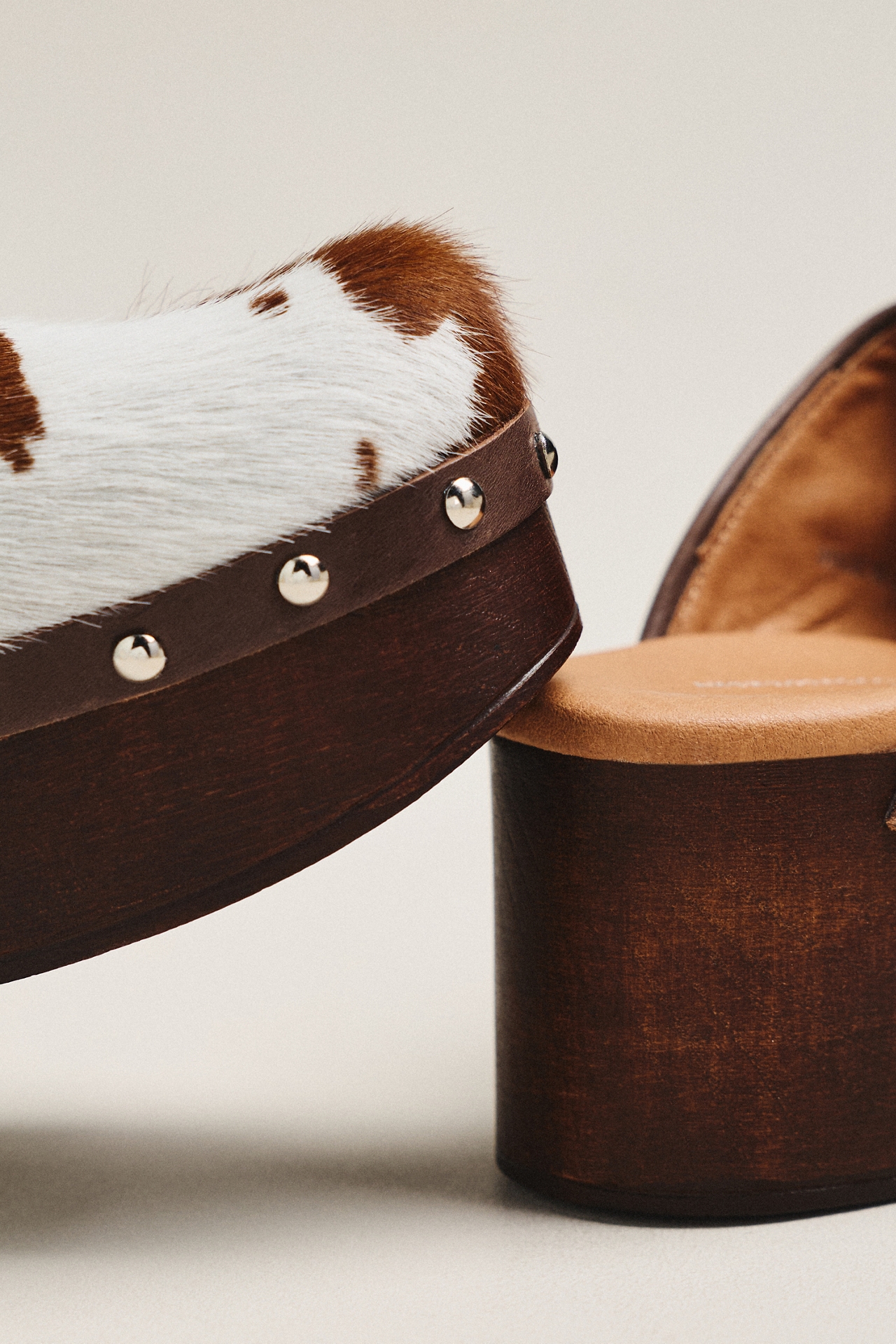 By Anthropologie Studded Cow Print Wood-Bottom Clogs