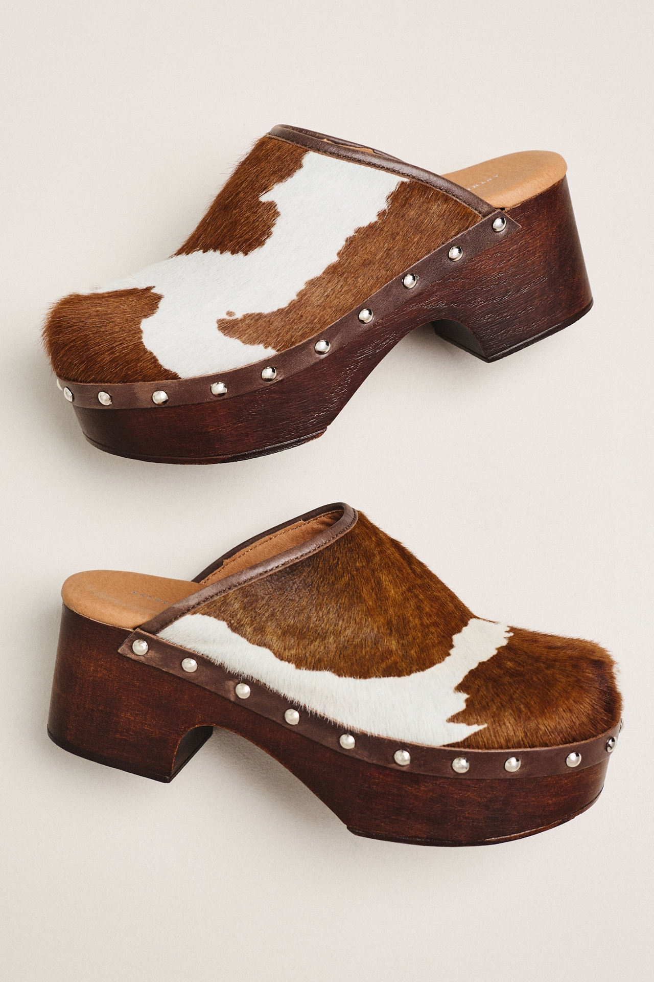 By Anthropologie Studded Cow Print Wood-Bottom Clogs