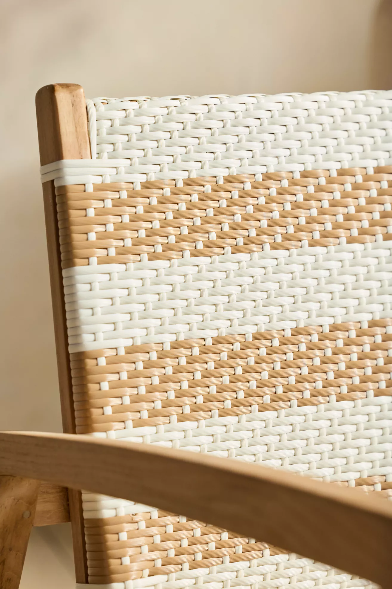 Close-up of woven pattern on chair back with cream and tan bands