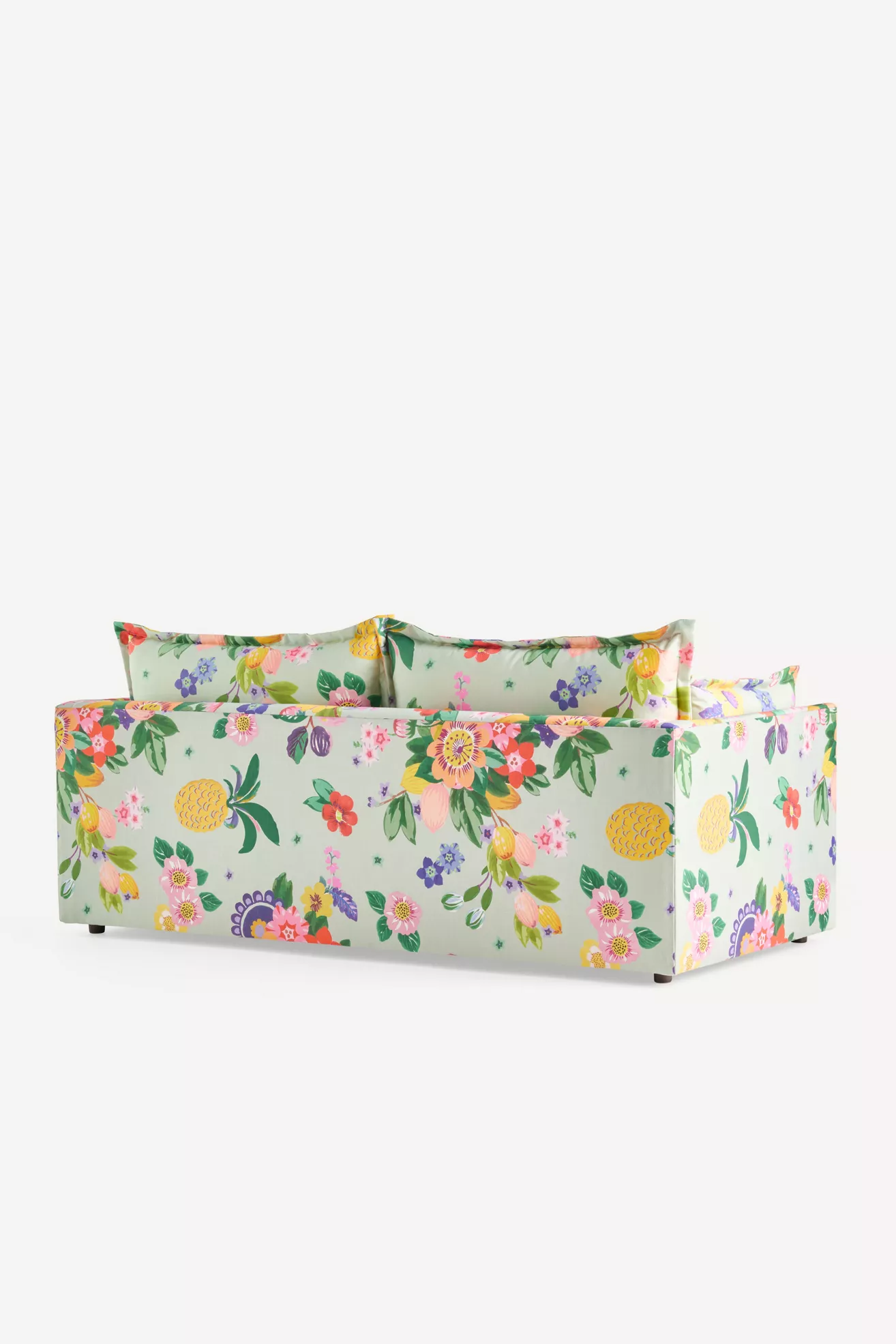 Denver outdoor sofa back angle view with vibrant floral cushions