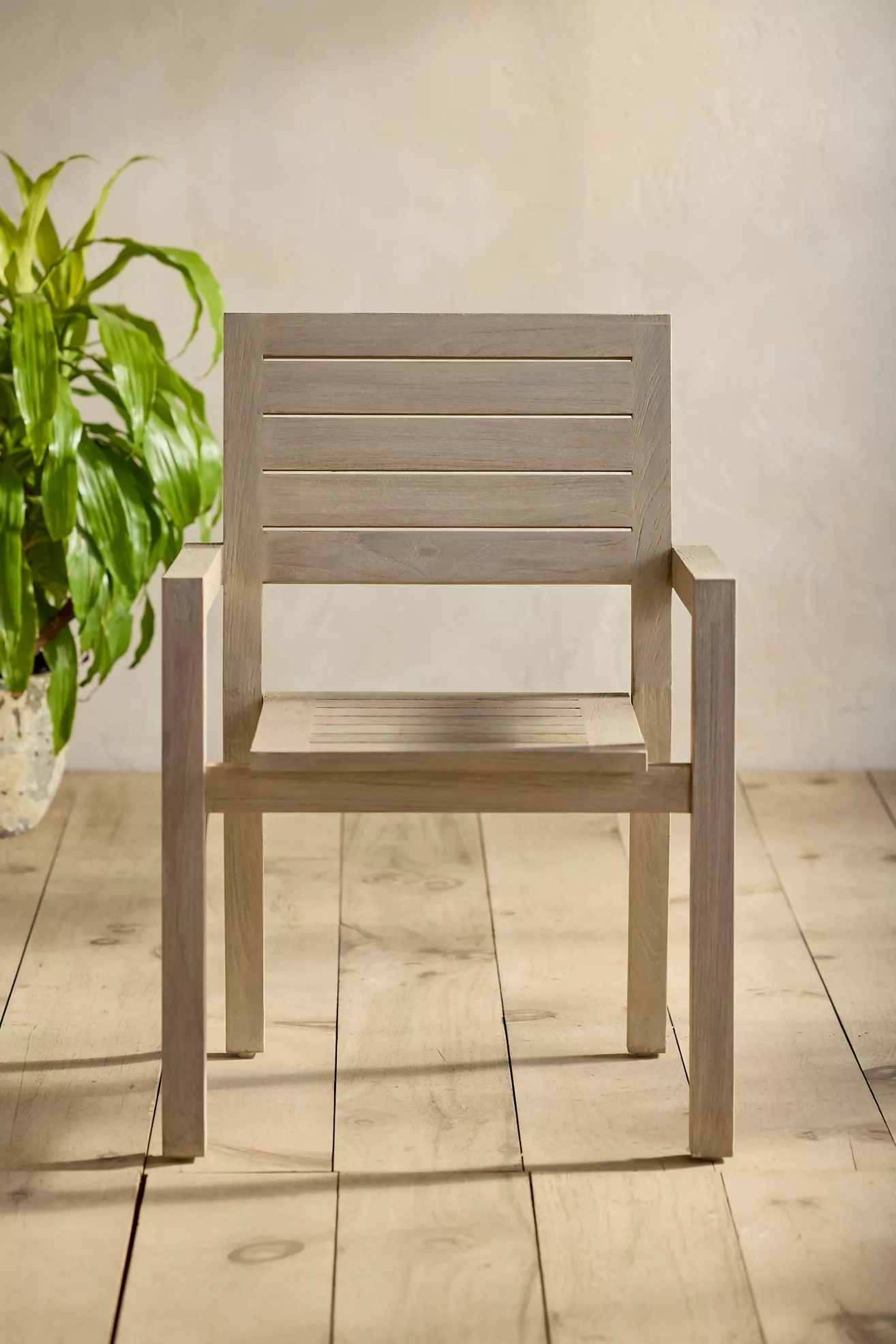 Front view of slatted teak chair
