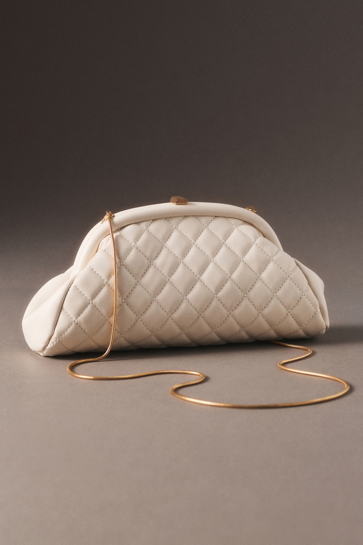Ivory quilted clutch with chain strap