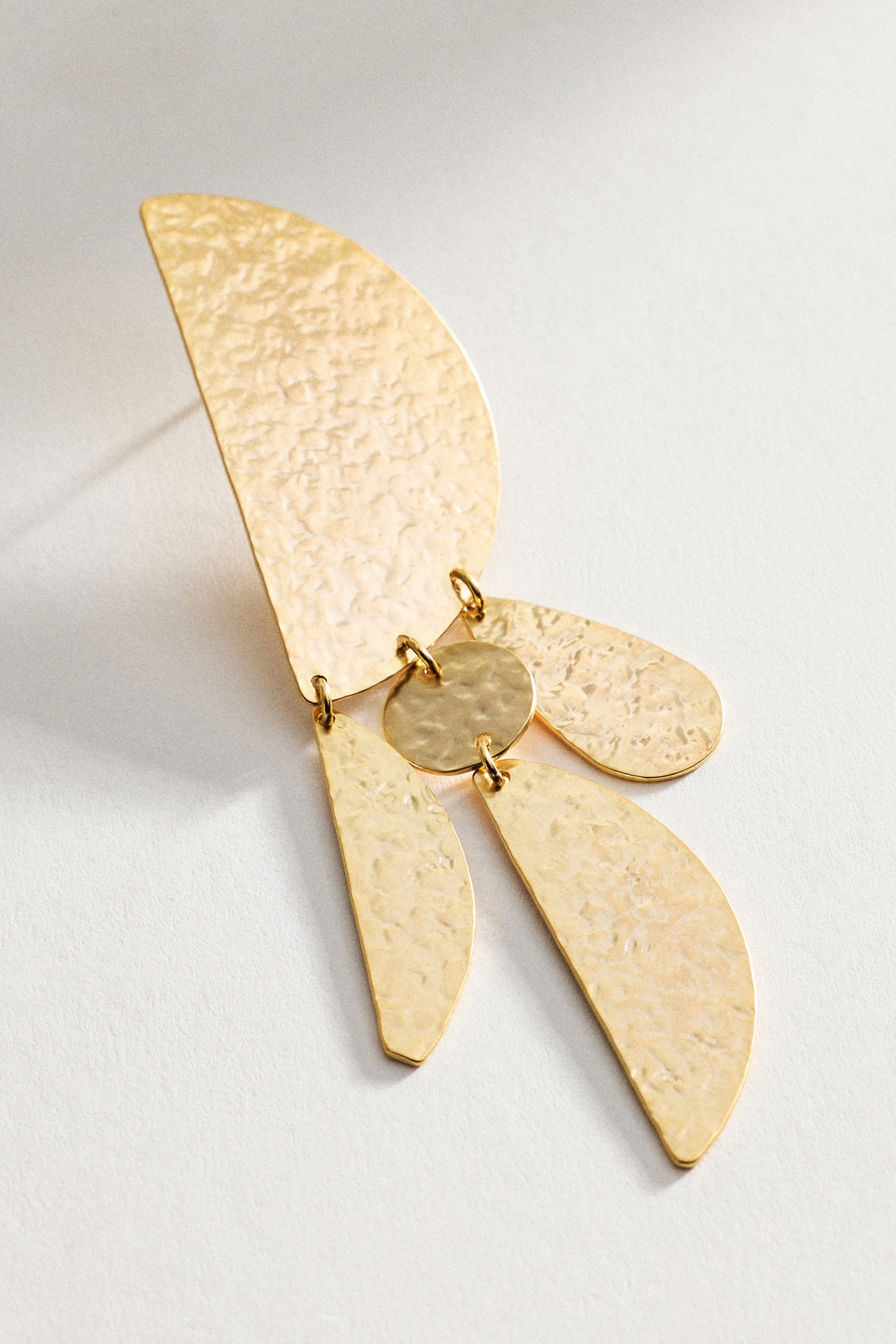 By Anthropologie Textured Crescent Earrings