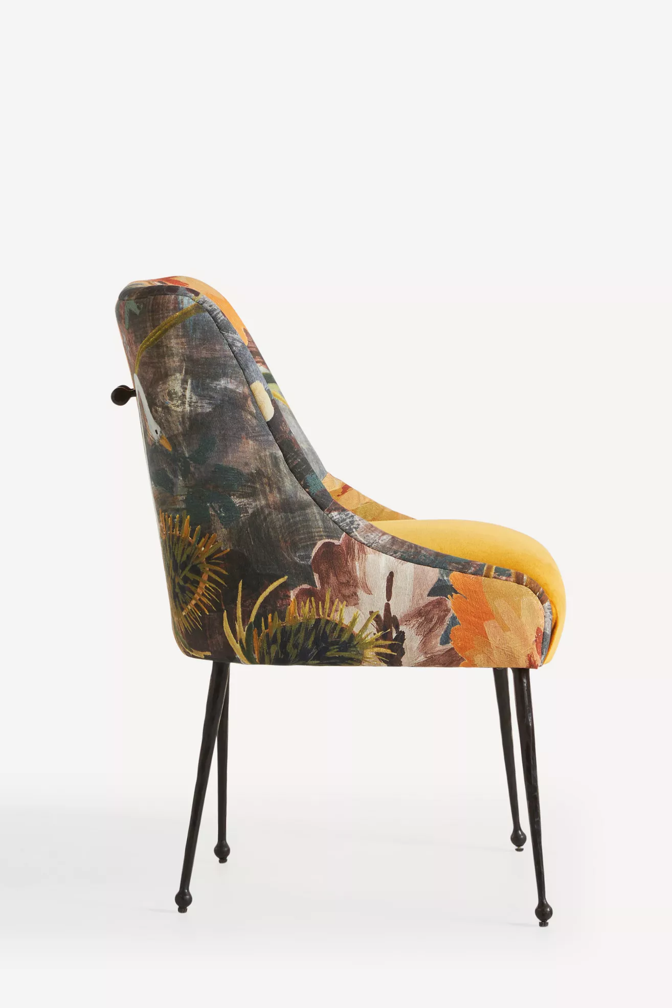 Side angle view of the chair showing profile and upholstery