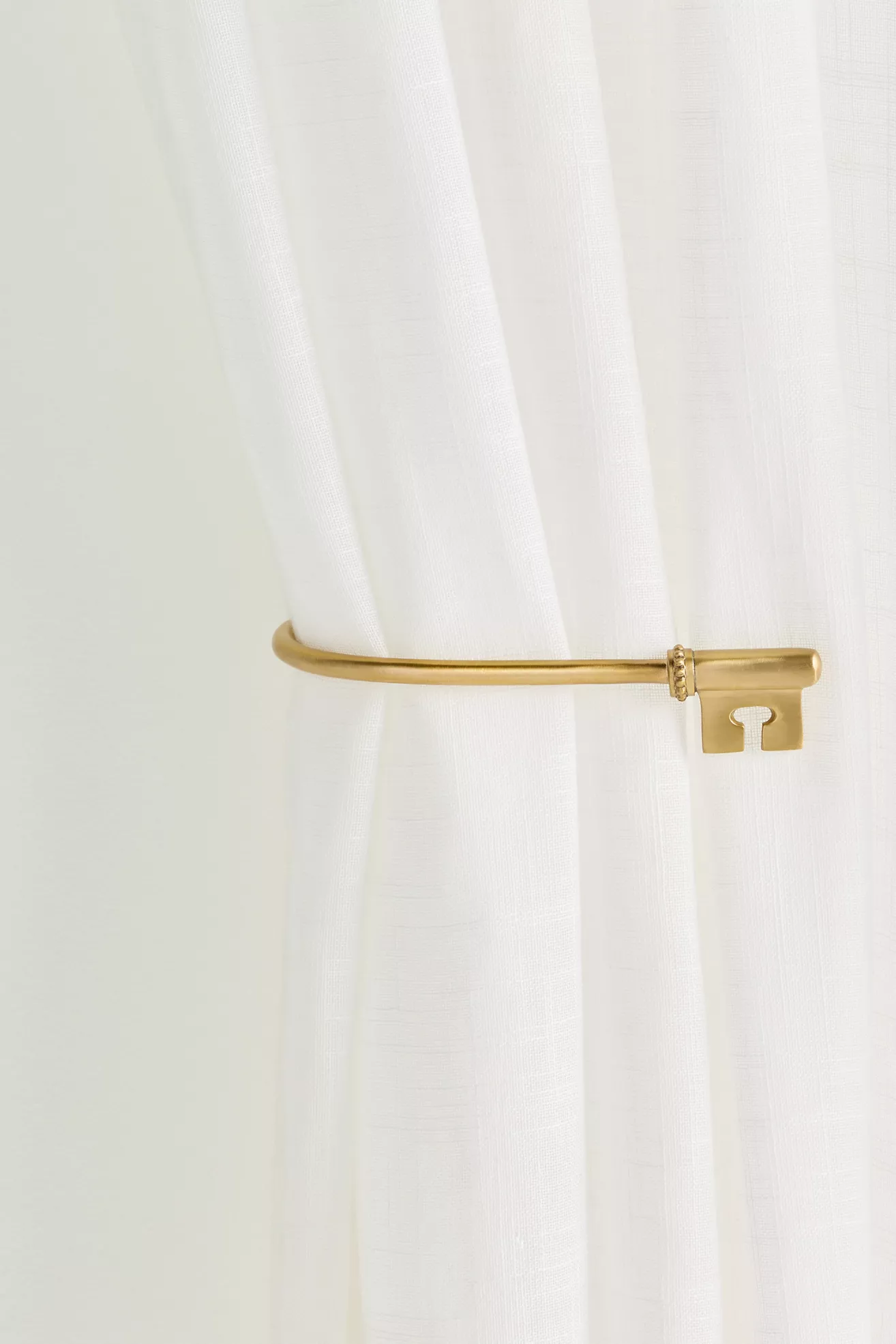 Chateau Key Brass Tieback