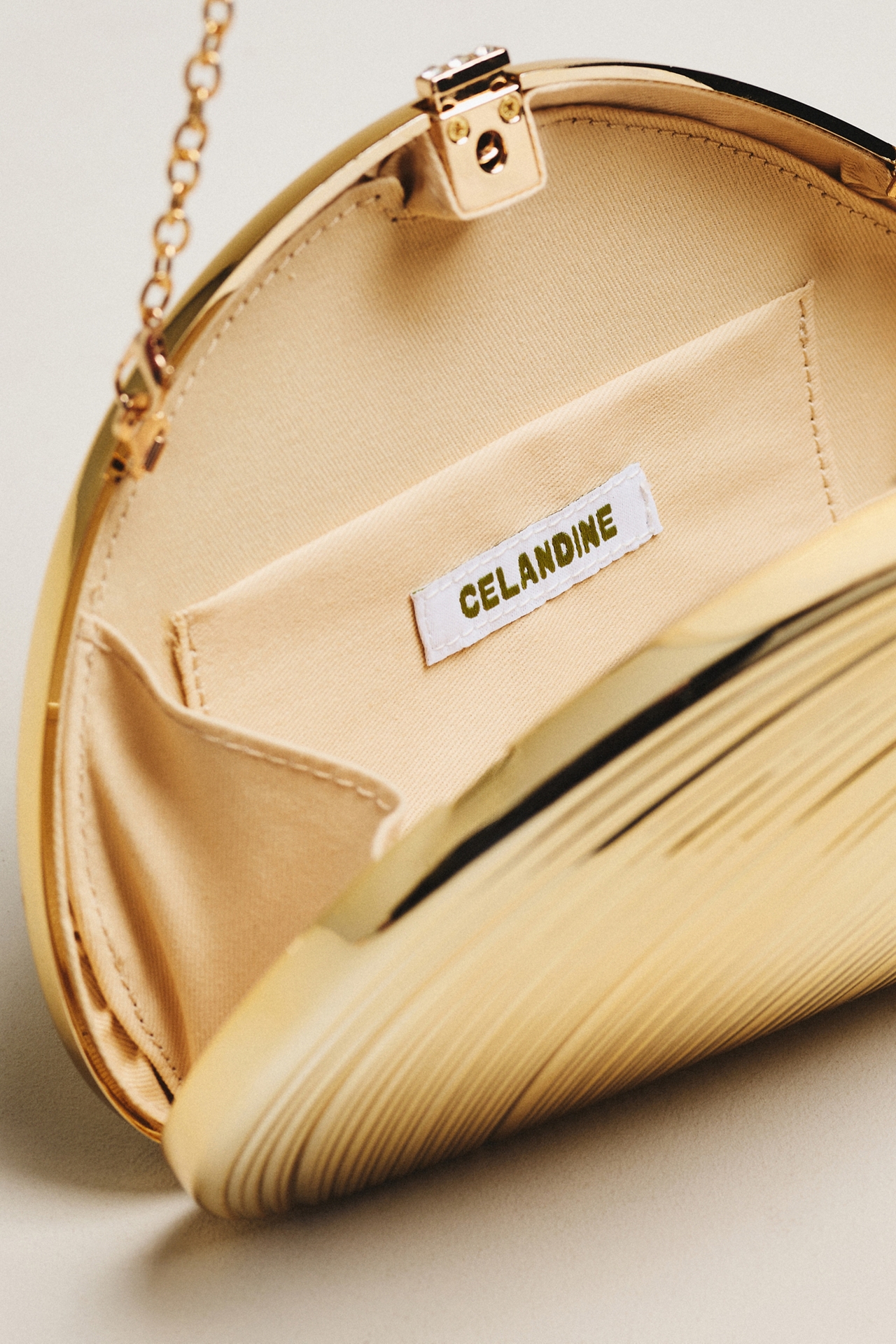 Celandine Metallic Seashell Clutch