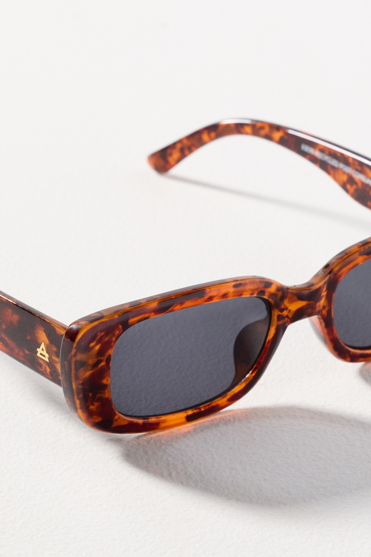 AIRE Ceres Slim Rectangle Sunglasses